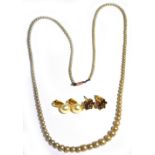 A cultured pearl necklace with 9ct gold