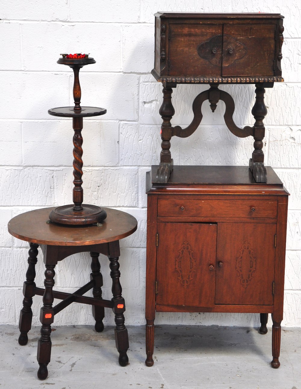 An early 20th century walnut cupboard, w