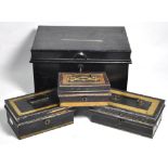 Four metal cash boxes of varying sizes (