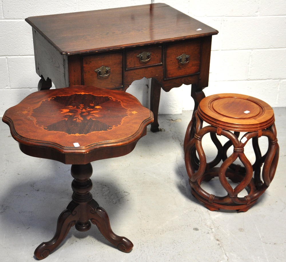 A 20th century oak side table with shape