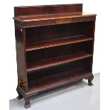 An Edwardian mahogany open bookcase, the