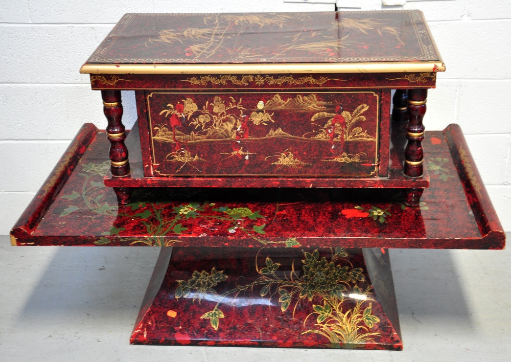 A reproduction Oriental red lacquer tabl