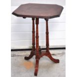 A Victorian octagonal tilt top table on