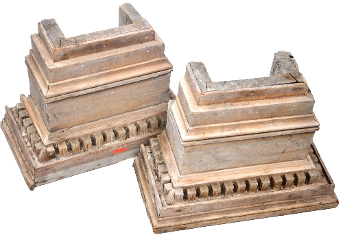 A pair of architectural wooden pediments