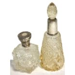 Two cut glass and silver perfume bottles