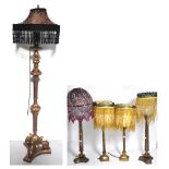 Four modern gilded table lamps and one s