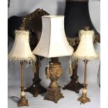 Five gilded table lamps, all in the clas