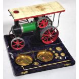 A boxed Mamod traction engine and a mode