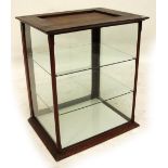 A late Victorian mahogany framed shop display cabinet with brackets for two shelves, width 56cm.