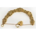 A 9ct gold gate link bracelet with heart shaped padlock clasp, approx 24g. CONDITION REPORT: S&K