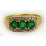 An 18ct gold emerald and diamond Art Dec