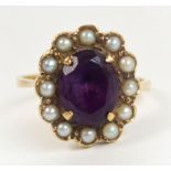 A yellow metal amethyst and pearl ring,