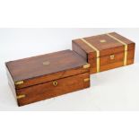 A 19th century rosewood veneered writing slope, with brass mounts to the corners centred with a