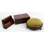 A simulated rosewood upholstered foot st