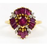 An 18ct yellow gold ruby and diamond rin