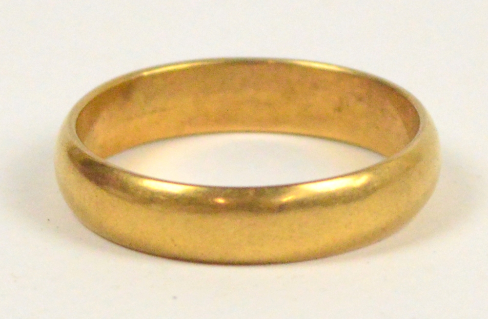 A 22ct yellow gold plain wedding ring, size S. CONDITION REPORT: Weight approx 5.8g.