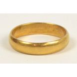 A 22ct yellow gold plain wedding ring, size S. CONDITION REPORT: Weight approx 5.8g.