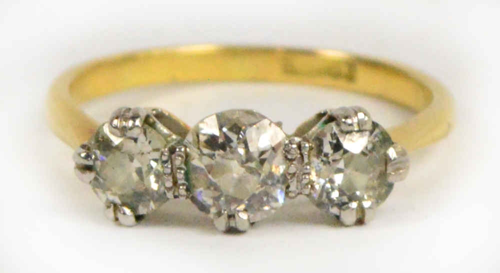 An 18ct yellow gold platinum mounted thr