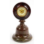 A late 19th century polished stone timep