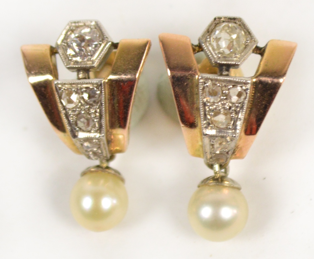 A pair of Art Deco gold, diamond and pearl earrings, the shaped frame set with a main diamond