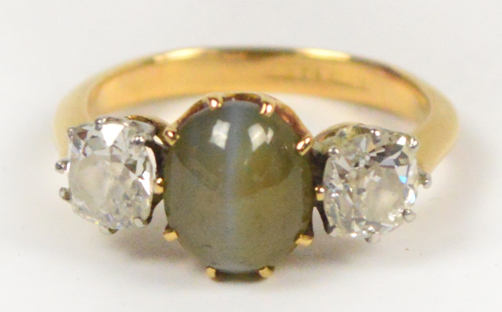 An 18ct yellow gold dress ring with cent