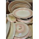 A Royal Doulton Art Deco part dinner service to include platters, tureens, gravy boats etc.