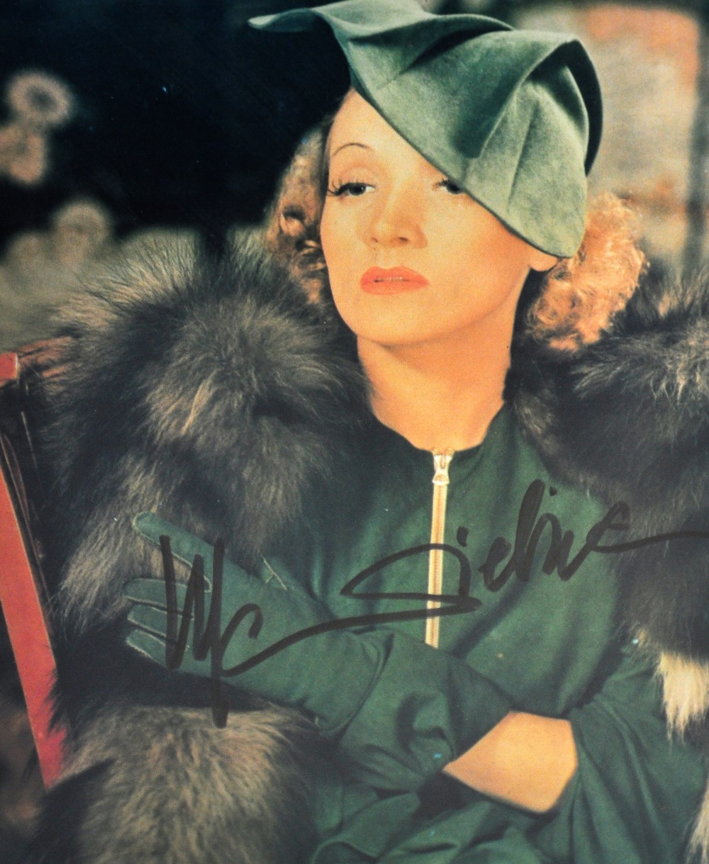 Marlene Dietrich; signed coloured photograph, 24.5 x 19cm, framed and glazed.