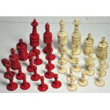 A late 19th/early 20th century bone chess set, each piece with turned decoration, height of king