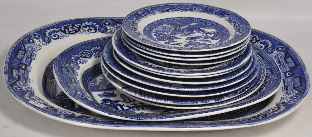 A large quantity of mainly 19th century blue and white transfer willow pattern to include tureens,