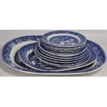 A large quantity of mainly 19th century blue and white transfer willow pattern to include tureens,