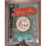 A vintage Pepsi-Cola advertising mirror with central oval image of a lady in period dress " The