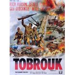 A poster for the film "Tobrouk" starring Rock Hudson, George Peppard, Guy Stockwell and Nigel