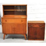 A 1970s retro light oak Golden Key side cabinet with glazed top section with internal tier and