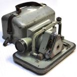 A metal cased Vickers Instruments Ltd Cooke Est 33 theodolite, two further theodolites and a small