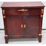 A Dutch mahogany gilt metal mounted side cabinet, the rectangular moulded top above single drawer