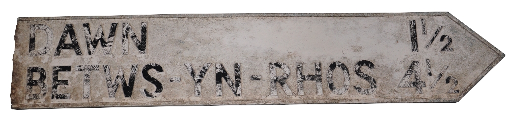 A double sided white painted aluminium road sign from North Wales, "Dawn, Betws-Yn-Rhos", length