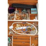 A quantity of costume jewellery including earrings, necklaces, brooches etc.