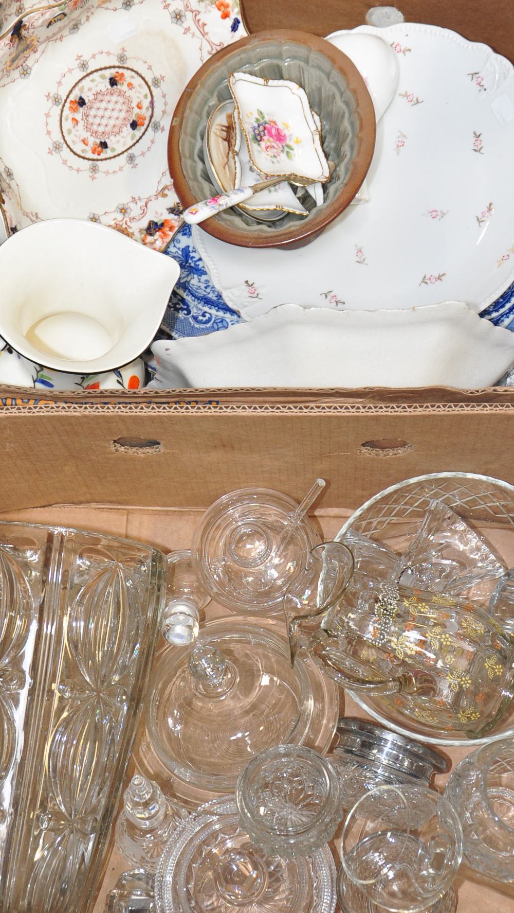 A box of ceramics to include blue and white meat plates, a quantity of glassware and a small