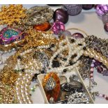 A small quantity of costume jewellery and vintage evening bags.