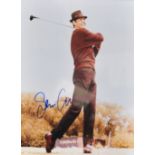 SEAN CONNERY; a signed colour photograph of the actor playing golf, 26 x 20cm, framed and glazed.