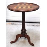 A Victorian mahogany occasional table, the dished circular top set with chess top inlay above