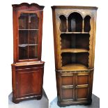A reproduction mahogany part glazed corner display unit with lower cupboard section, a 20th century