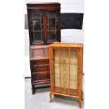 A 1940s oak part glazed bureau on block supports, height 194cm and a retro display cabinet with two