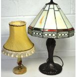 A Tiffany style lamp and an onyx and brass table lamp (2).