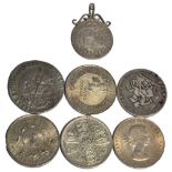A small quantity of coins to include a commemorative Winston Churchill coin, a George III silver