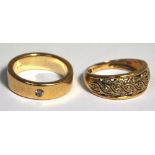 A 9ct gold wedding band set with a small white stone, size I and a further 9ct gold dress ring,