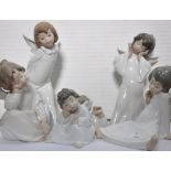 Six Lladro angel figures in choir boy surplus in various poses (6). CONDITION REPORT No visible