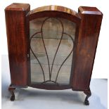 A circa 1930 mahogany Art Deco display cabinet with glazed door with beaded decoration and two