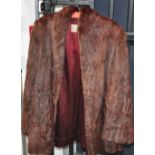 A vintage ladies three quarter length fur coat with label inscribed "Creamer & Co Liverpool".