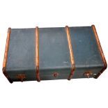 An early/mid 20th century green travelling trunk.